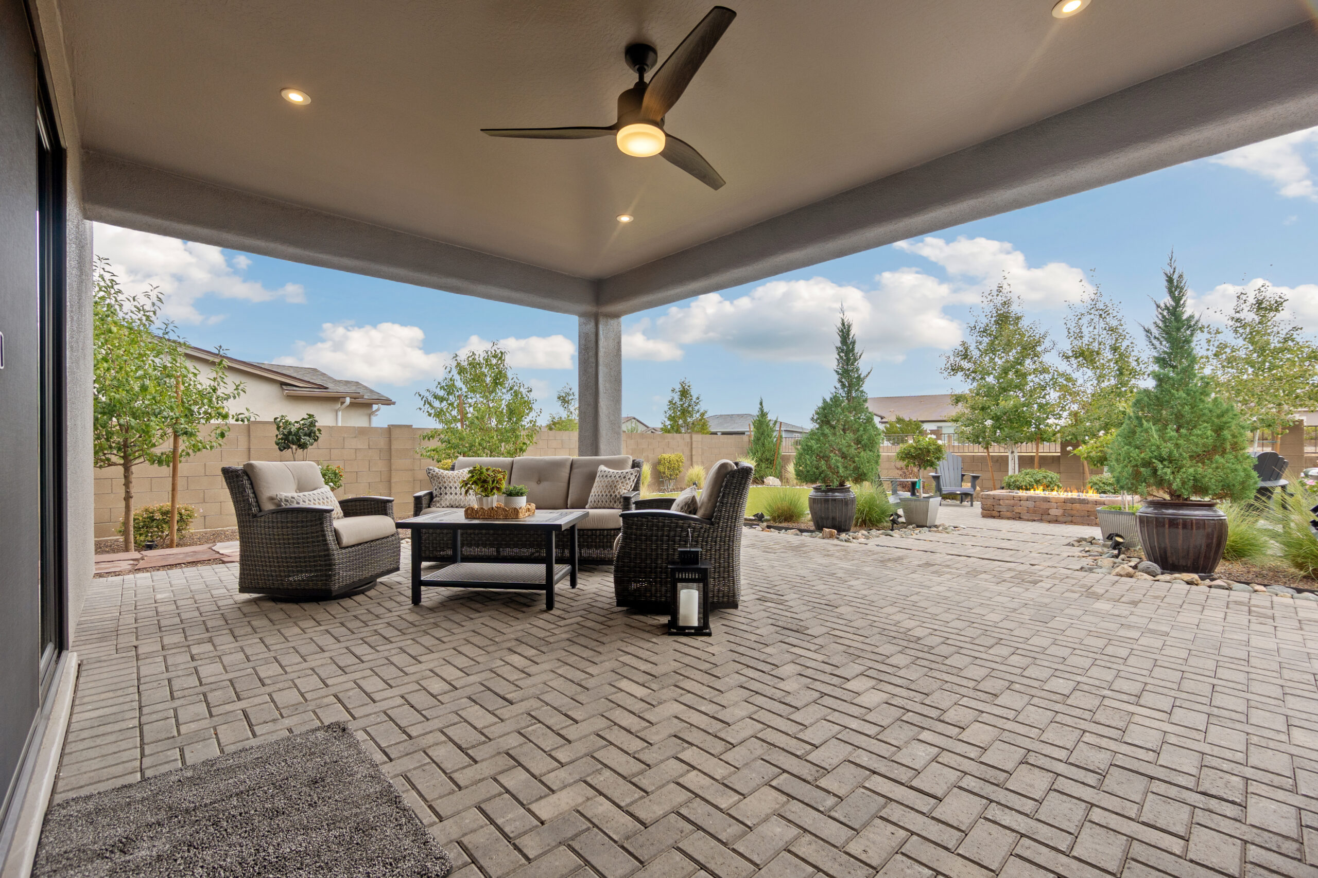 outdoor ceiling fan mounted on covered patio
